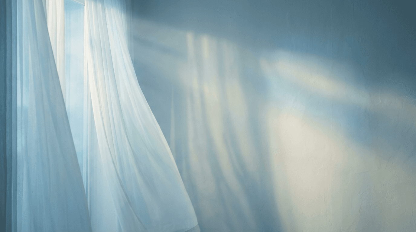 Ethereal blue-toned light filtering through translucent curtains with soft rays and gentle shadows.